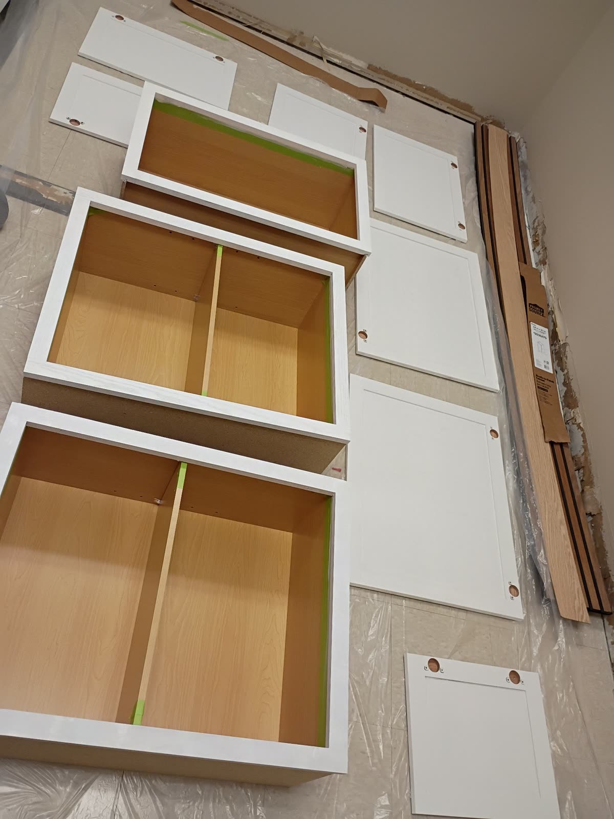 Cabinet doors primed and drying