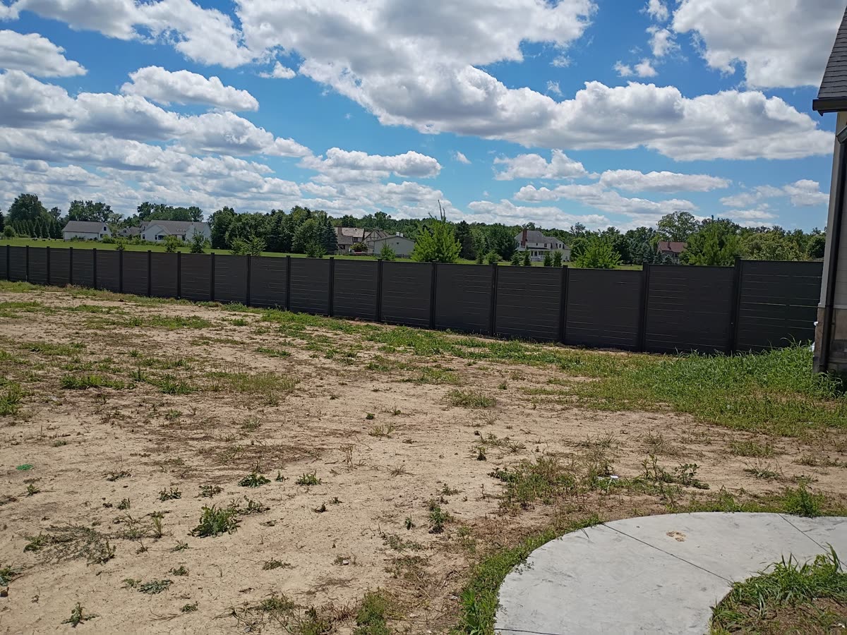 Charcoal stained fence, finished full run