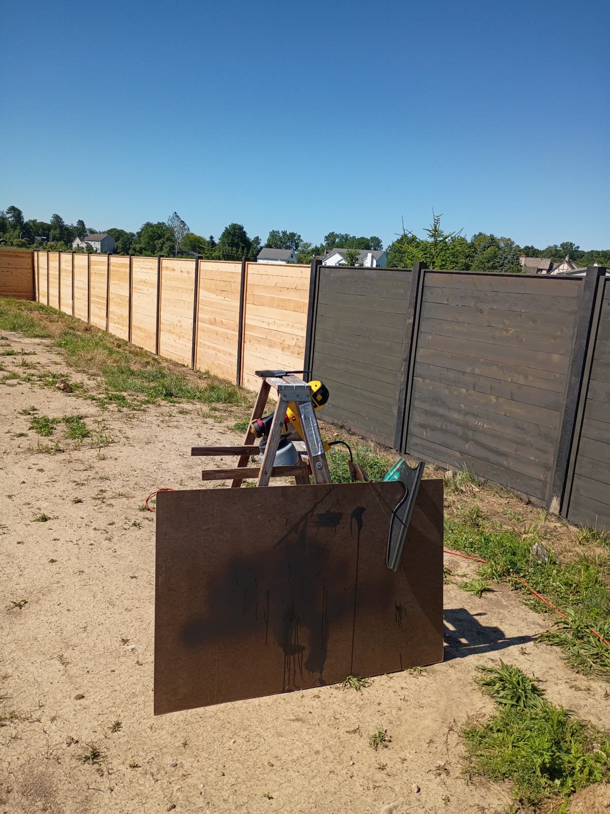 Fence staining in progress