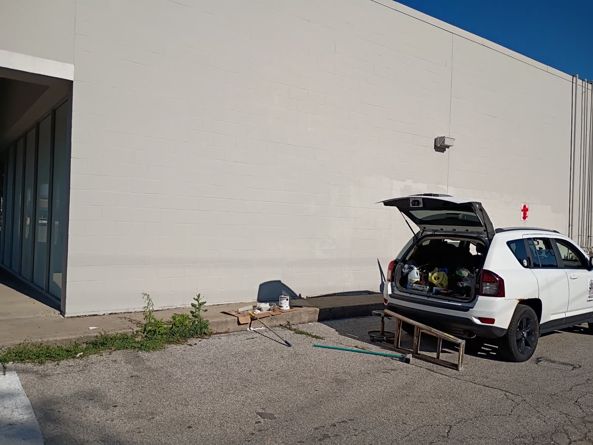 Commercial wall fully restored after graffiti