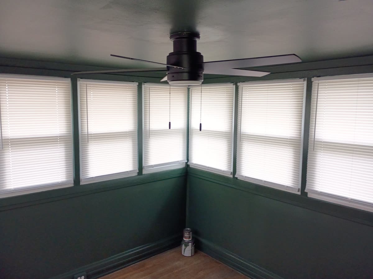 Deep green sunroom after repaint